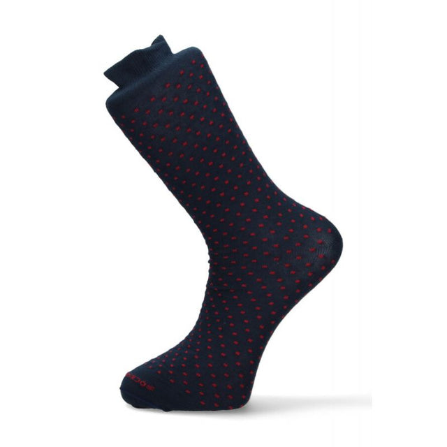 Chaussette bleue à pois rouges