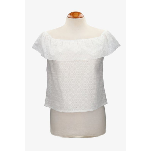 Perforated blouse with ruffles