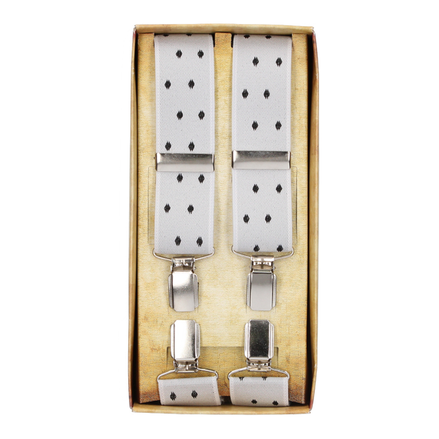 Robe blanche à bretelles à pois noirs