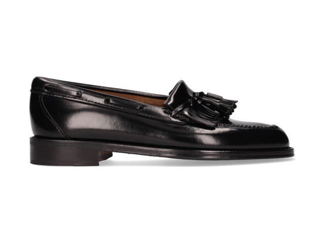 Touffe de glands et de franges noires