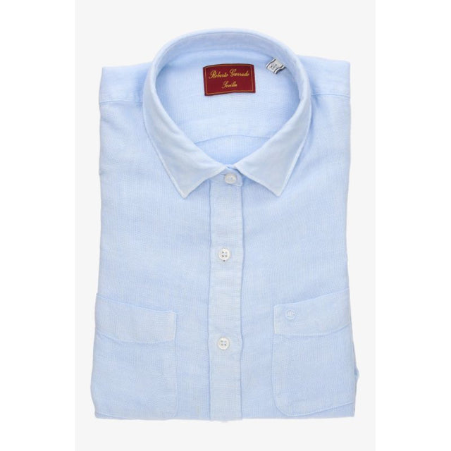 Two-pocket light blue linen shirt
