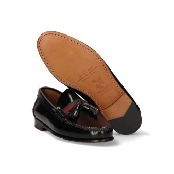 Mocassin avec pompons noir et ornement gucci
