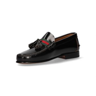 Mocassin avec pompons noir et ornement gucci