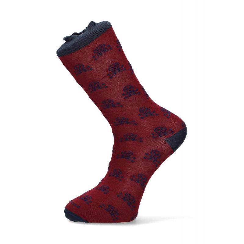 Burgundy and blue sock with skull pattern