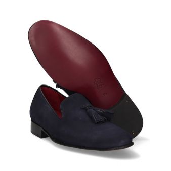 Copete avec pompons en daim marine