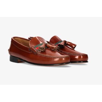 Leather tasseled moccasin with Gucci embellishment