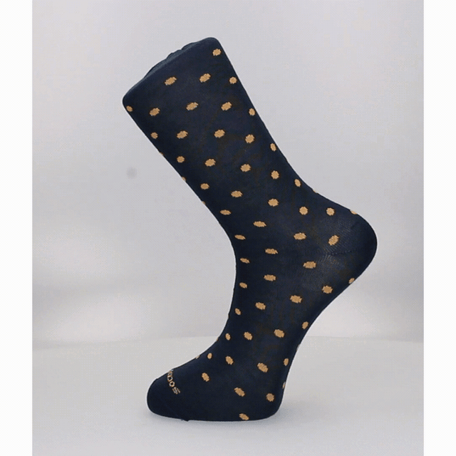 CHAUSSETTE À POIS BLEUS