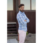 CAMISA CELESTE LINEAS AZULES