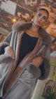 Poncho elegante pelo marrón